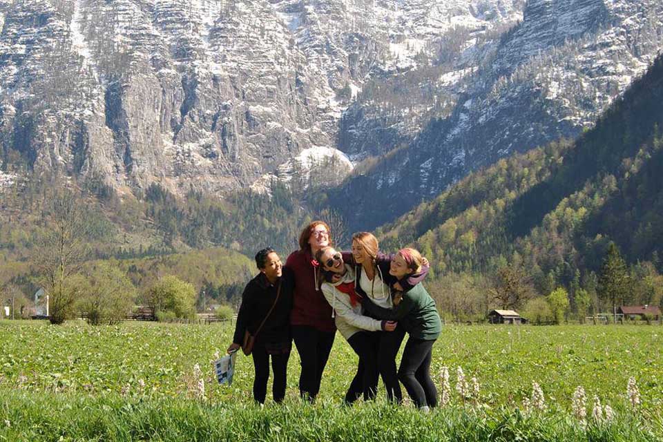 Students in front of mountains Students in front of mountains