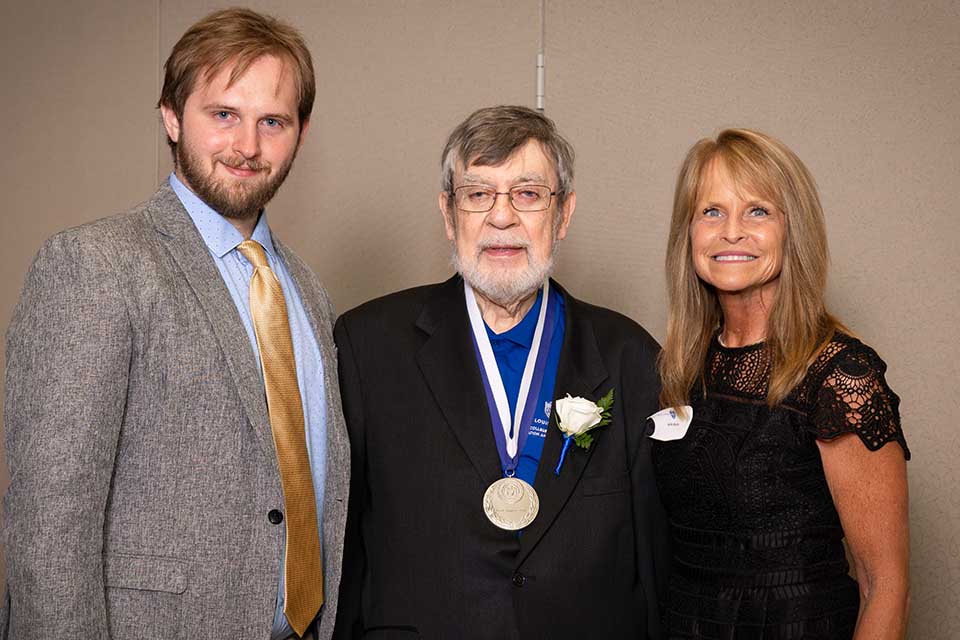 Alumni Merit Awards Frank Magiera, Ph.D. (PC ’62) poses with his family