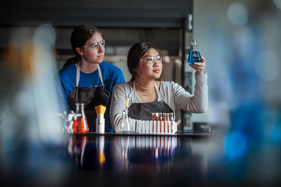 Chem lab Two women work in a chemistry lab.