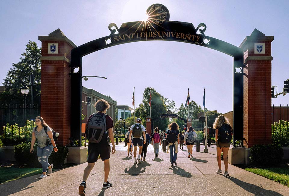 First day Students walk under the Saint Louis University archway on campus on the first day of classes.