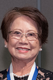A headshot of a woman.