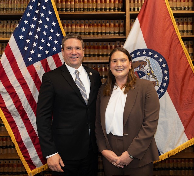 Paige Mitchell stands next to Missouri Attorney General Andrew Bailey Paige Mitchell stands next to Missouri Attorney General Andrew Bailey