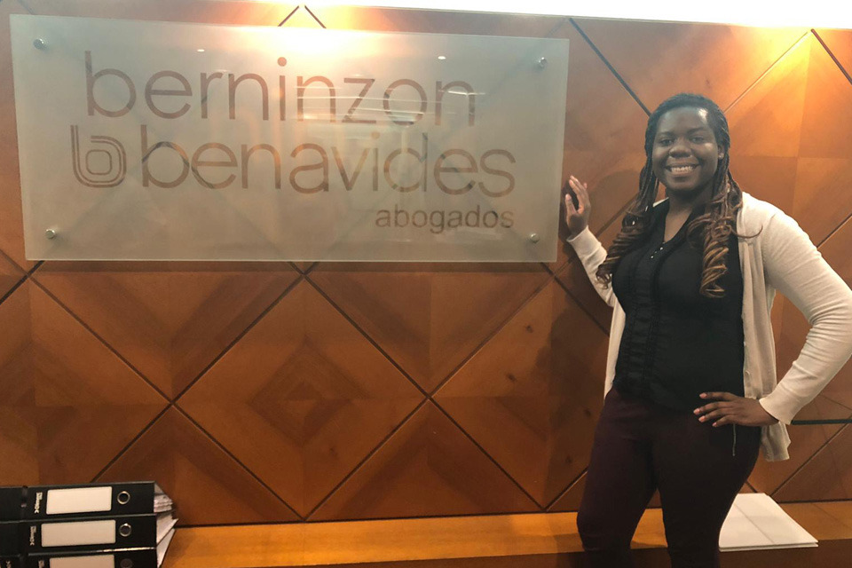 Codi Cox poses in front of the Berninzon & Benavides Abogados sign. Codi Cox poses in front of the Berninzon & Benavides Abogados sign.