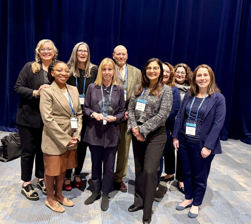 Sidney Watson and a group of health law professors Sidney Watson holds her award with a group of health law professors at the annual AALS meetin