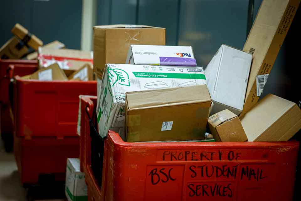 Mailroom packages Packages stacked in the mailroom