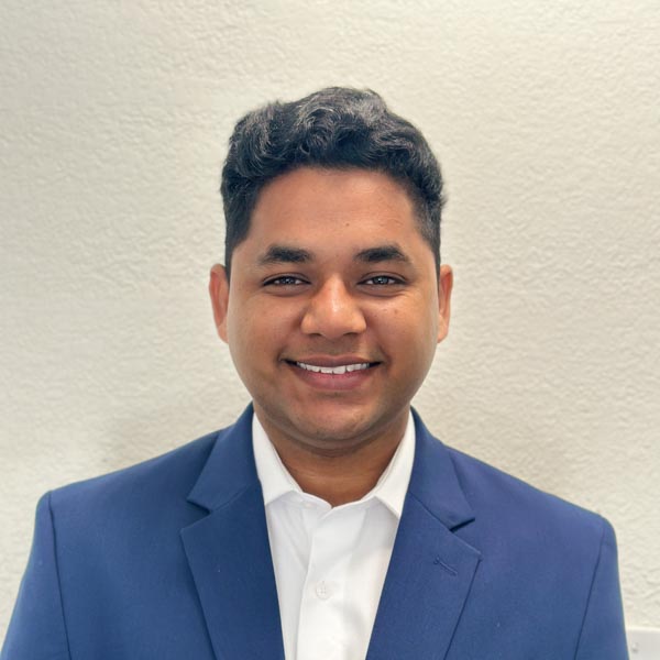 Jeevan Reddy Gujjula smiling in a professional headshot.