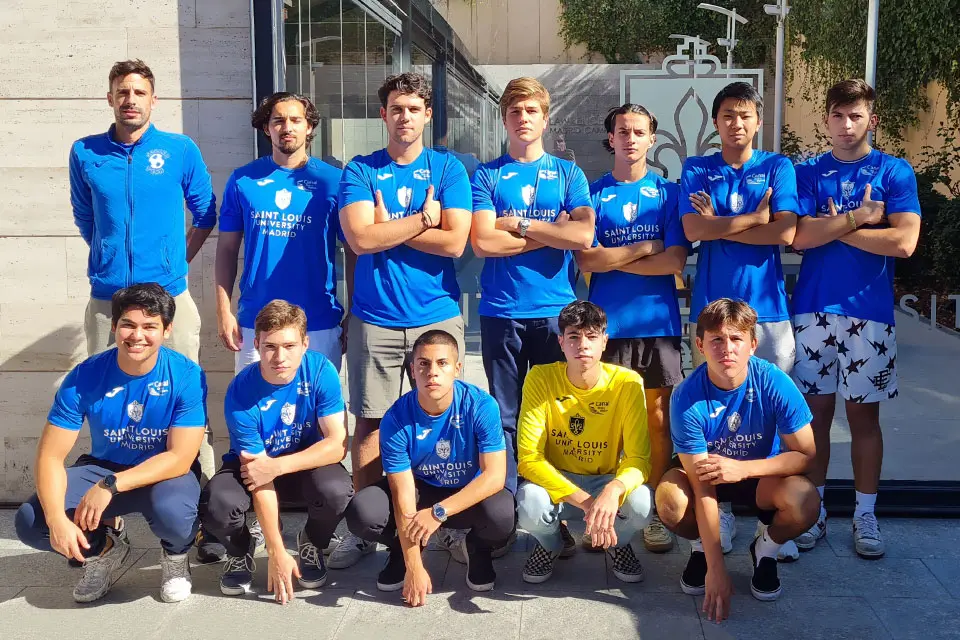 SLU-Madrid soccer team A A soccer team posing for a group photo