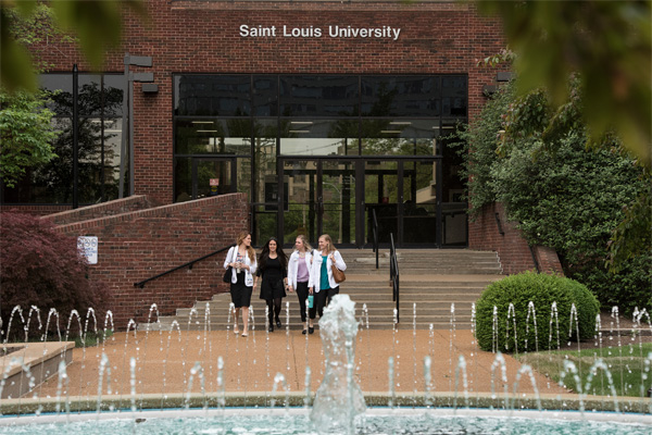 Group of students walking out of the LRC Group of students walking out of the LRC