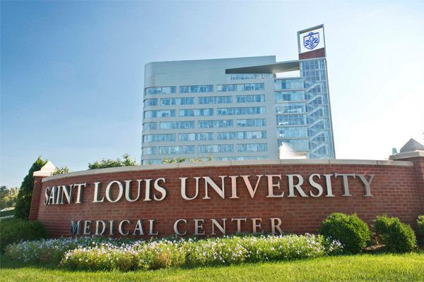 Image and Reputation Exterior of Doisy Research Center behind a large sign that reads Saint Louis University Medical Center