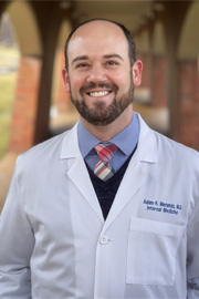 Headshot of Adam Merando Headshot of Adam Merando