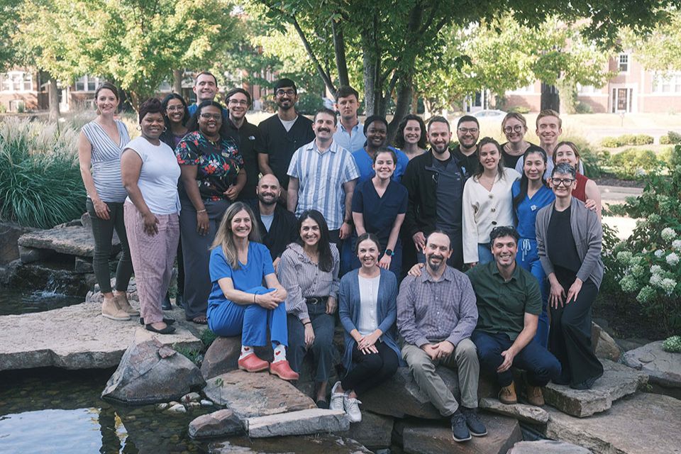Family Medicine residents, faculty and staff Family medicine residents, faculty and staff pose outdoors on SLU's campus