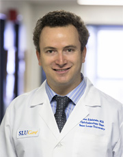 Headshot of Sean Edelstein, wearing white coat Headshot of Sean Edelstein