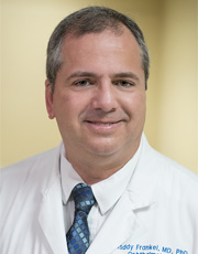 Headshot of Roddy Frankel, wearing white coat and smiling Headshot of Roddy Frankel