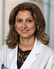 Hedshot of Ghadban Rafif, wearing white coat and smiling Hedshot of Ghadban Rafif