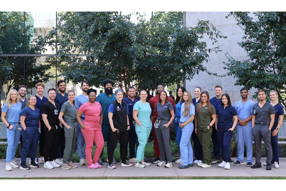 Group photo of emergency residents Group photo of emergency residents standing outside SSM Health Saint Louis University Hospital