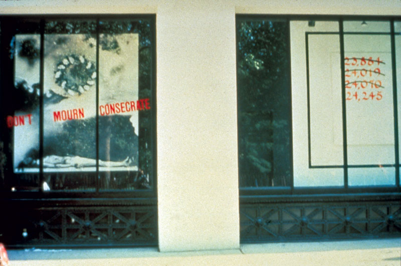 Juan González, Don’t Mourn, Consecrate, 1987. Installed at Grey Art Gallery, New York University, 1987. An artwork by Juan González titled Don’t Mourn, Consecrate, shown installed in the street level windows of the Grey Art Gallery at New York University in 1987.
