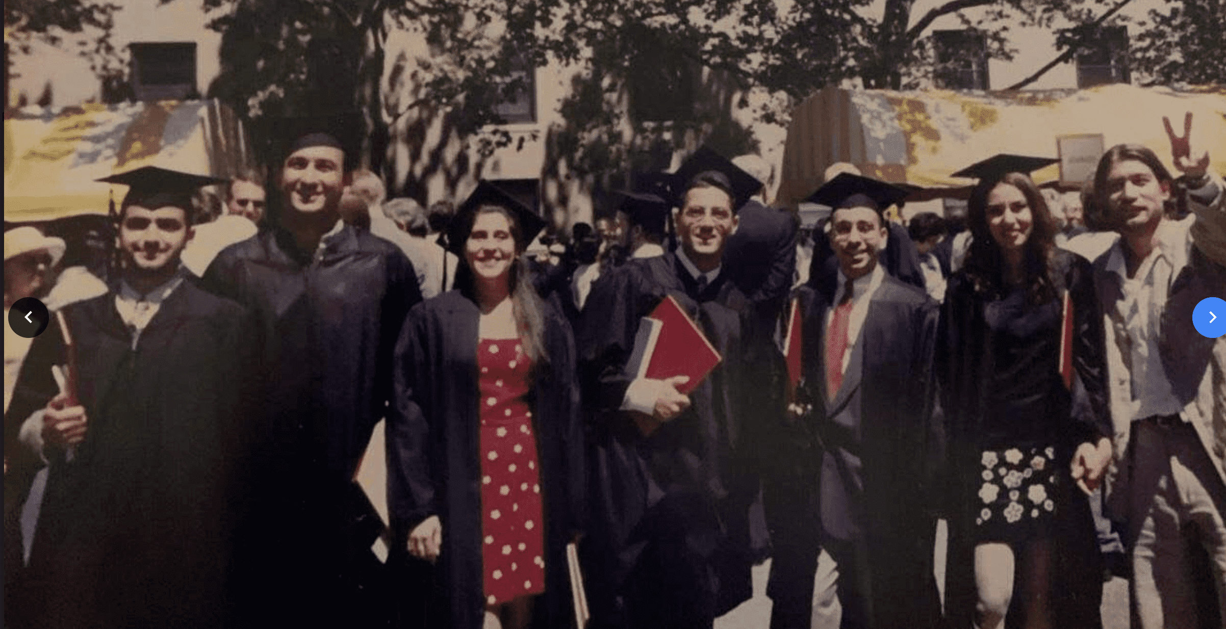 Alameh pictured with members of the Lebanese Club at her graduation. She earned a master’s in civil engineering and civil planning from the Massachusetts Institute of Technology (MIT) in 1997. A group of graduates in caps and gowns smile at the camera.